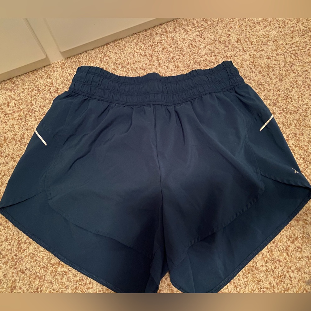 Women’s All In Motion green/blue athletic shorts | Size M